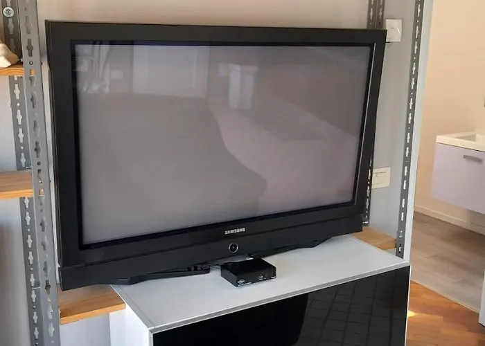 Corte Cavour. Mansarda Nel Cuore Della *